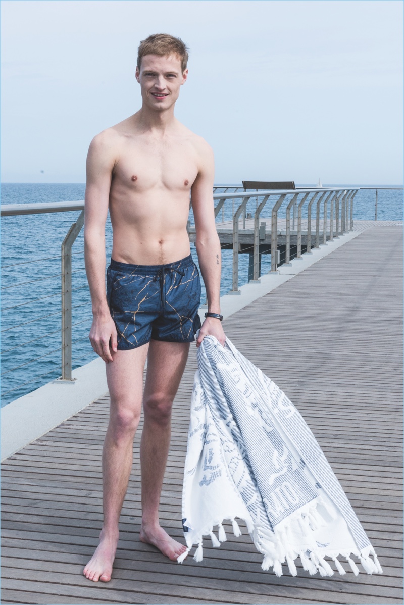 Model Dane Bell sports swim shorts from Antony Morato's summer #GetLoose collection.