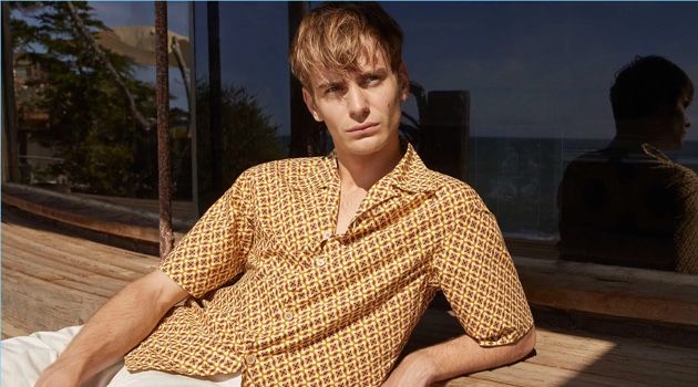 Ben Allen Sports Vacation Style for Matches Fashion Ben Allen dons a Prada floral print shirt with Giorgio Armani shorts.
