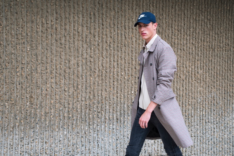 Deakin wears trench Topman, jacket Zara Man, cap NIKE, and jeans Dr Denim.