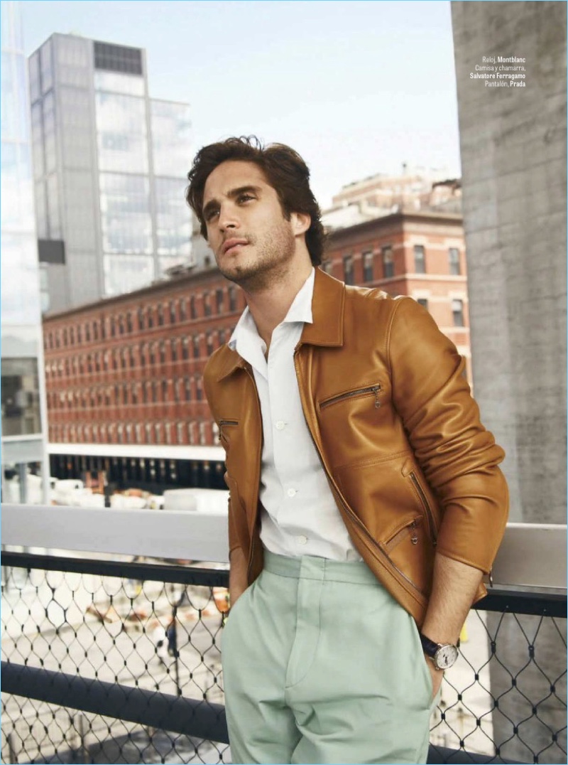 A smart vision, Diego Boneta wears a shirt and leather jacket by Salvatore Ferragamo. Boneta also rocks Prada trousers.