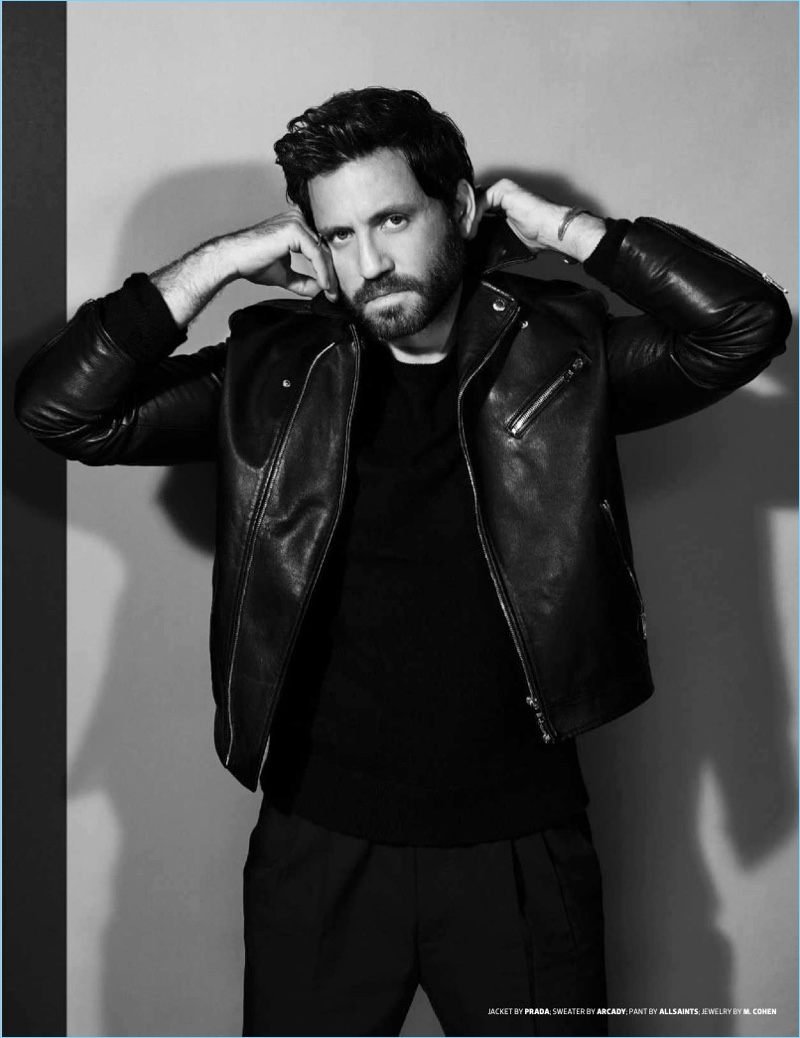 Edgar Ramirez sports a Prada jacket, Arcady sweater, and AllSaints pants.