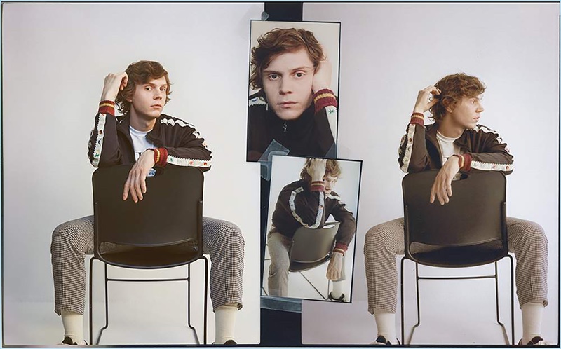 Connecting with Mr Porter, Evan Peters wears a Kapital track jacket with a Flagstuff t-shirt, Vans sneakers, and Wacko Maria trousers.
