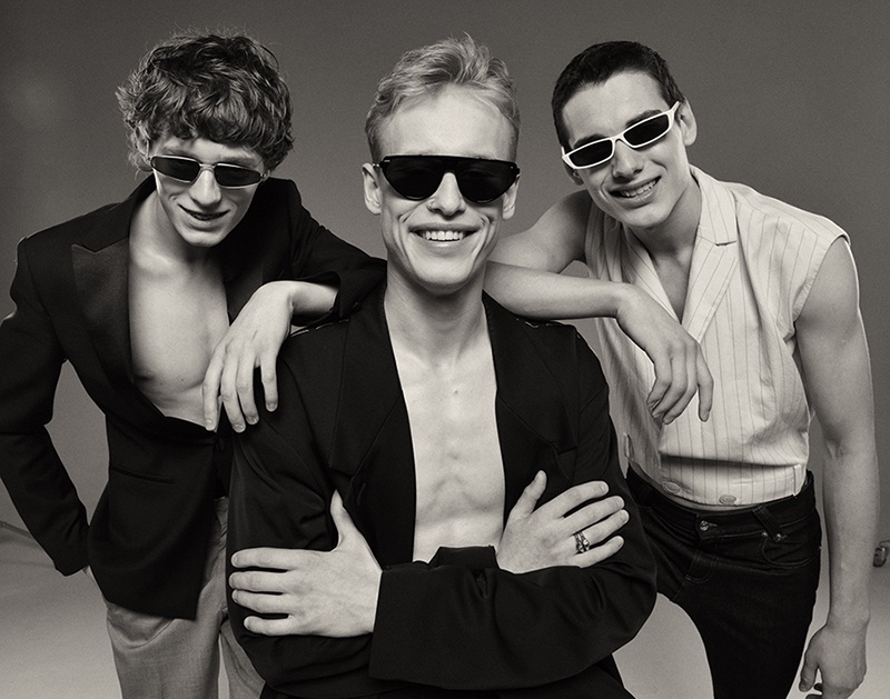 Left to Right: Artem wears tuxedo jacket Saint Laurent, trousers COS, and sunglasses ASOS. Dmitry wears jacket Maison MArgiela, pants Dior Homme, and sunglasses Dior Homme. Misha wears vest Salvatore Ferragamo, jeans Versace, and sunglasses ASOS.