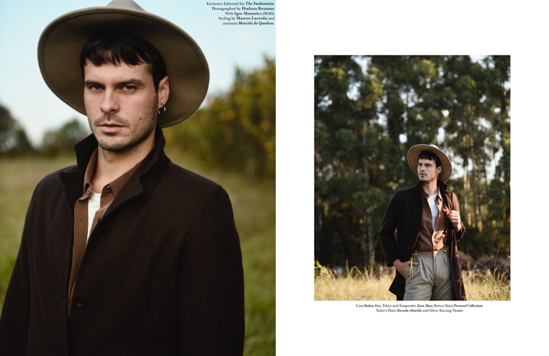 Igor wears shirt stylist's own, trousers Ricardo Almeida, silver earring Vivara, coat Rodeo, hat, t-shirt, and suspenders Zara Man.