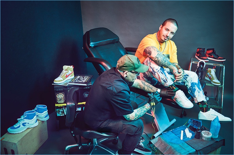 Connecting with Footwear News, J Balvin gets his Amiri sneakers tattooed by artist Andres Hurtado. 