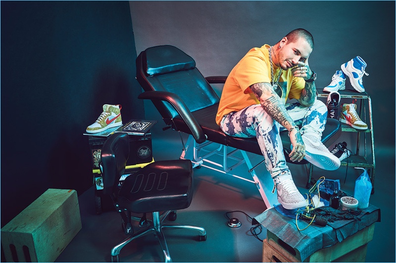 J Balvin wears fall 2018 Nike Air Force 1 Hi LV8 "Just Do It" sneakers.