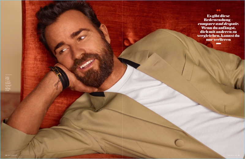 Starring in a photo shoot for GQ Germany, Justin Theroux wears a Prada jacket, Sunspel t-shirt, and Hermès bracelet.