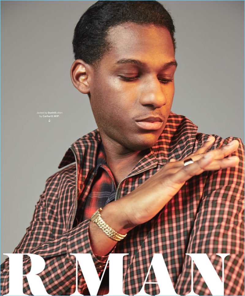 Starring in a photo shoot, Leon Bridges wears a check Dunhill jacket with a Carhartt WIP shirt.