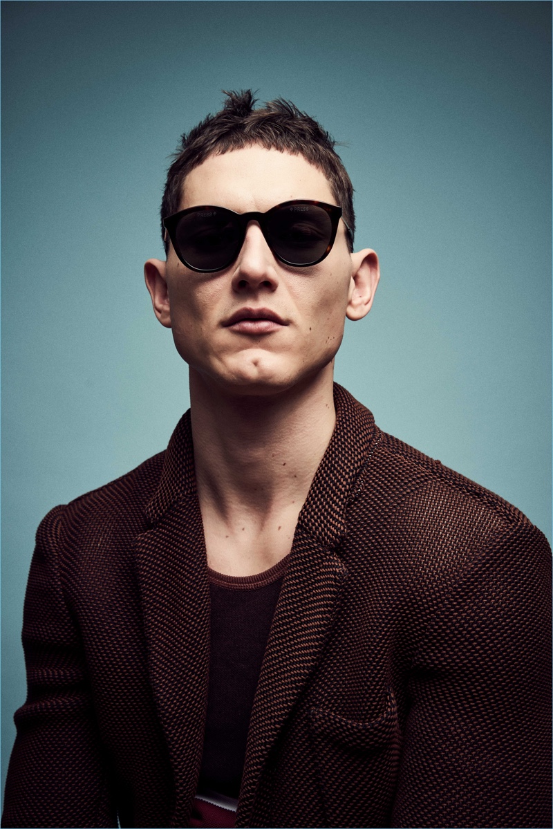 Alex Pierce wears Polaroid sunglasses. 