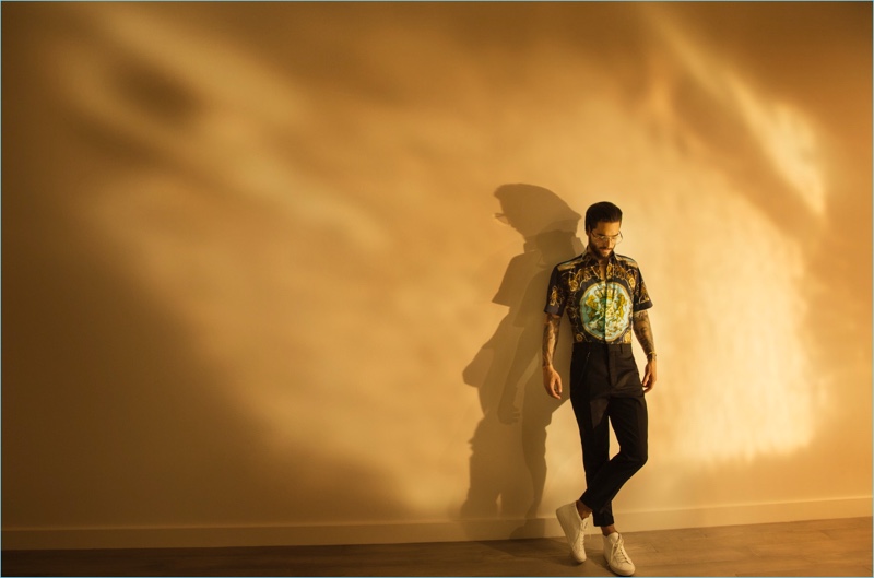 Making a fashion statement, Maluma wears a Dolce & Gabbana shirt, Pierre Hardy shoes, and pants by The Kooples. » Maluma Covers Haute Living, Talks F.A.M.E. Album & English Music Making a fashion statement, Maluma wears a Dolce & Gabbana shirt, Pierre Hardy shoes, and pants by The Kooples.