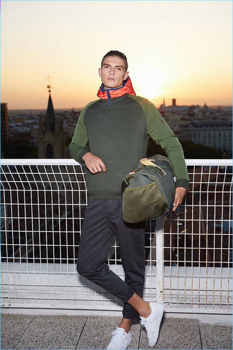 Embracing sporty style, Guerrino Santulliana rocks a pre-fall 2018 look from Pepe Jeans.