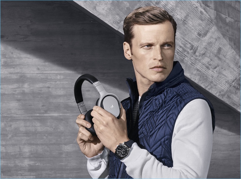 Model Lars Burmeister poses with headphones from Porsche Design.