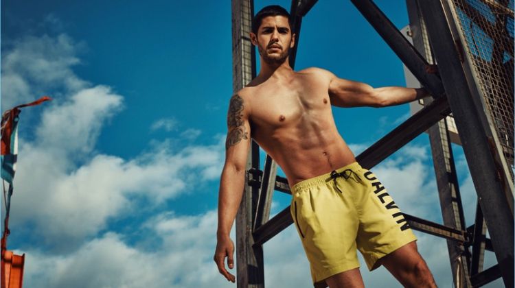 René Grincourt wears summer swimwear from Calvin Klein.