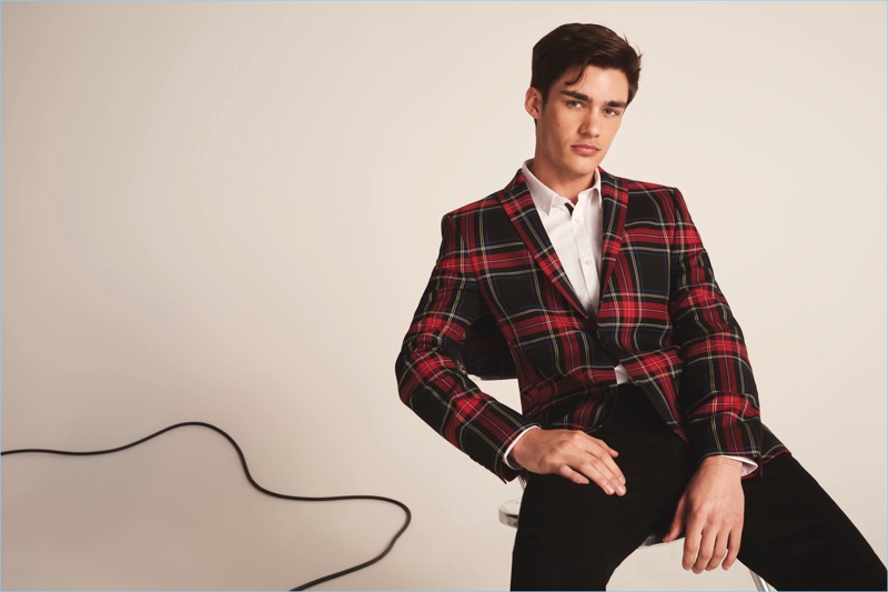 Ready for the holidays, David Bywater wears a tartan suit jacket from River Island.