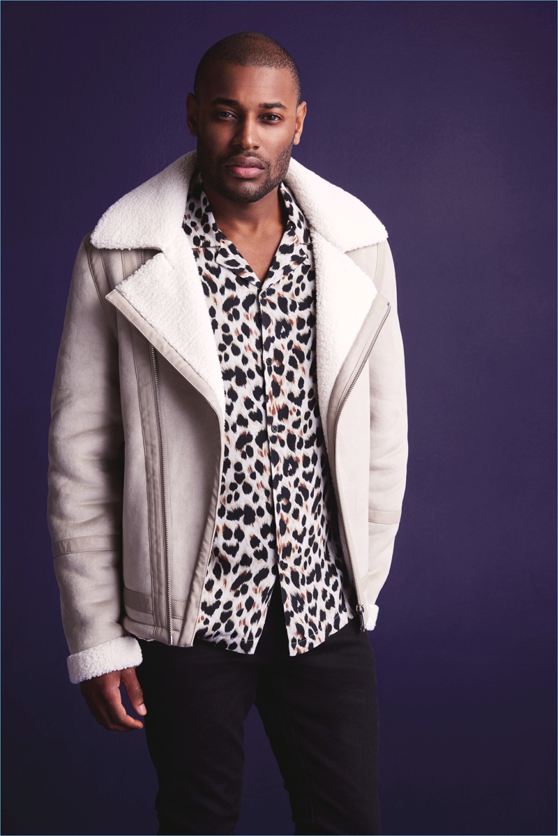 Roger Dupé is a trendy vision in a leopard print shirt and shearling jacket by River Island.
