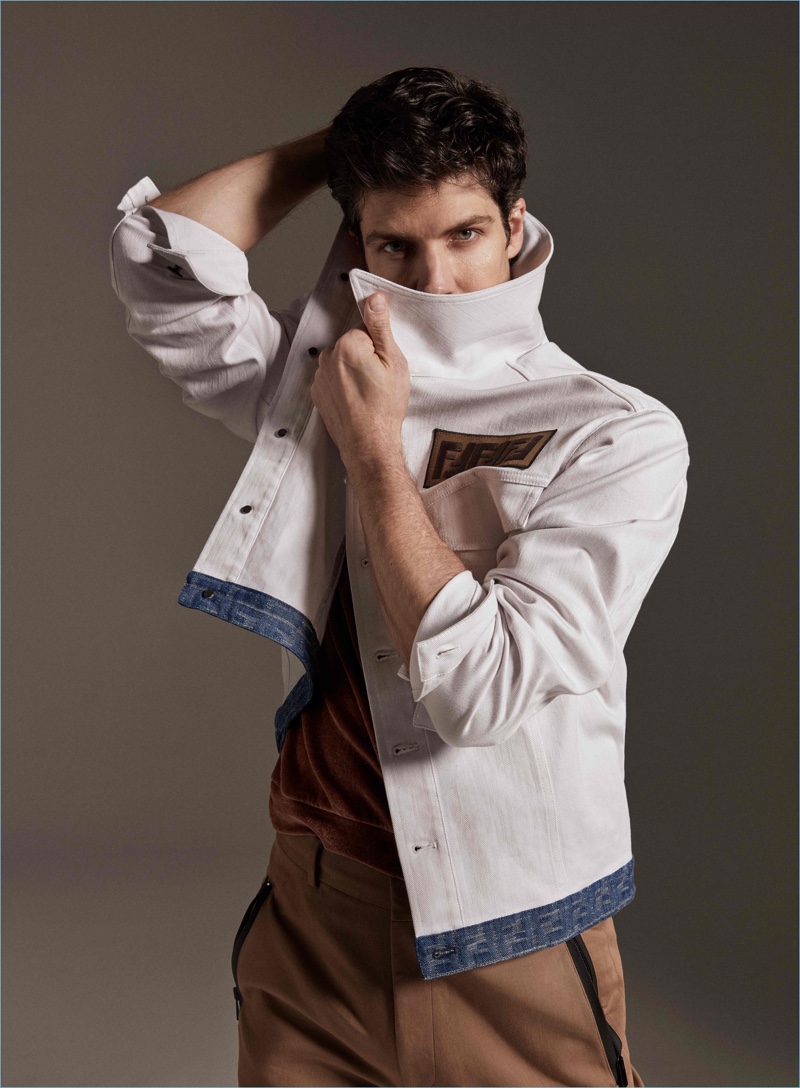 Starring in a new photo shoot, Roberto Bolle wears a jacket and trousers by Fendi. A Bottega Veneta top completes his look.