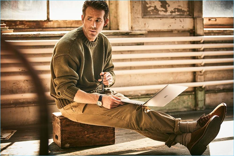 Actor Ryan Reynolds sports a Dries Van Noten sweater, Monitaly trousers, and Lanvin suede derby shoes.