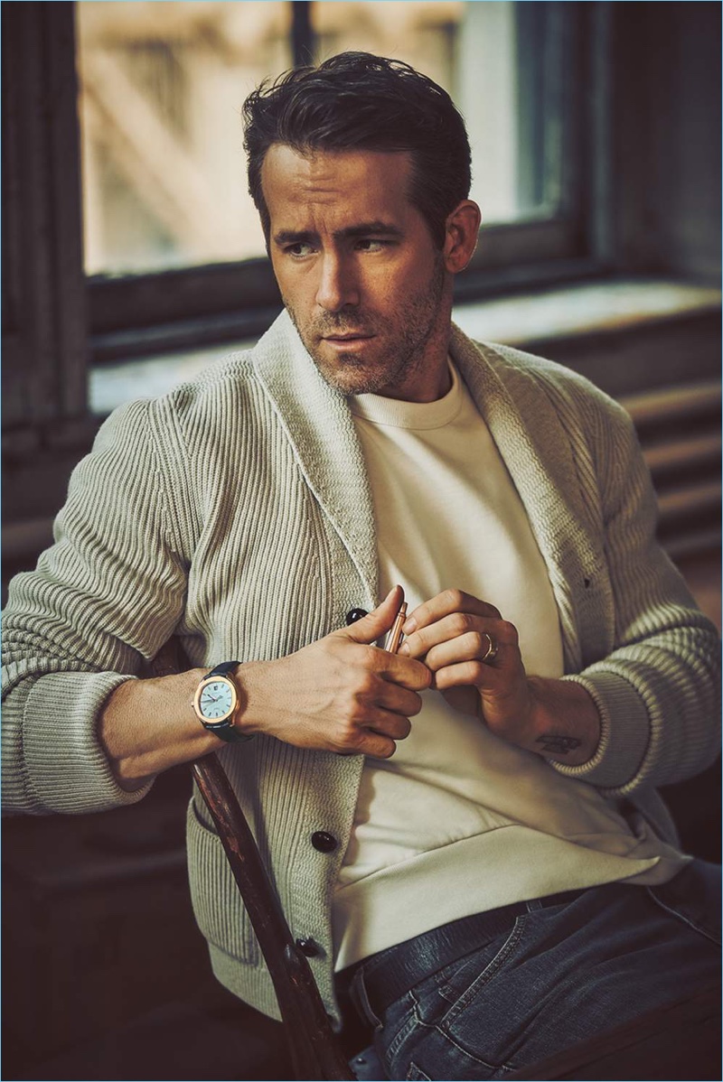 At ease in front of the camera, Ryan Reynolds wears a Tom Ford wool cardigan and Dries Van Noten sweatshirt. He also rocks Stella McCartney jeans and a RRL leather belt.