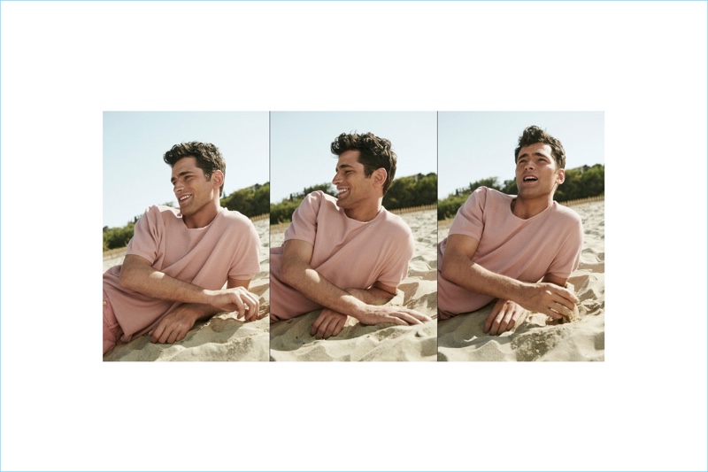 Sean O'Pry dons a short-sleeve sweater with matching Bermuda shorts.