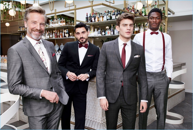 Dressed to impress, Rainer Andreesen, Arthur Kulkov, Bo Develius, and Hamid Onifade wear red accessories by LE 31.