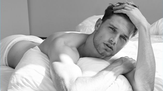 Stefan Pollmann Appears in New Photos by Ignazio Lozano Relaxing in bed, Stefan Pollman poses for a photo update.