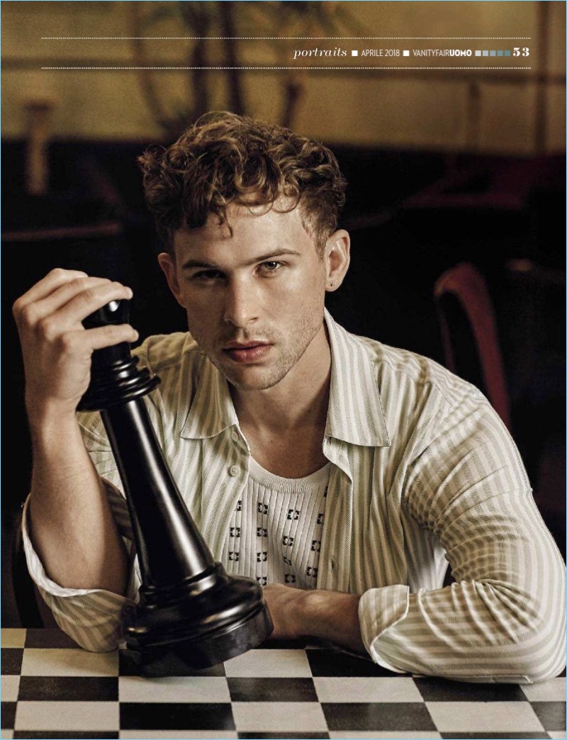 Sitting for a photo, Tommy Dorfman wears Marni.