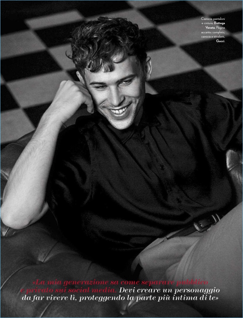 All smiles, Tommy Dorfman wears Bottega Veneta.