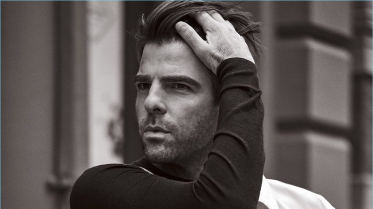 Starring in a photo shoot, Zachary Quinto wears a BOSS coat and trousers with a Hermès sweater.