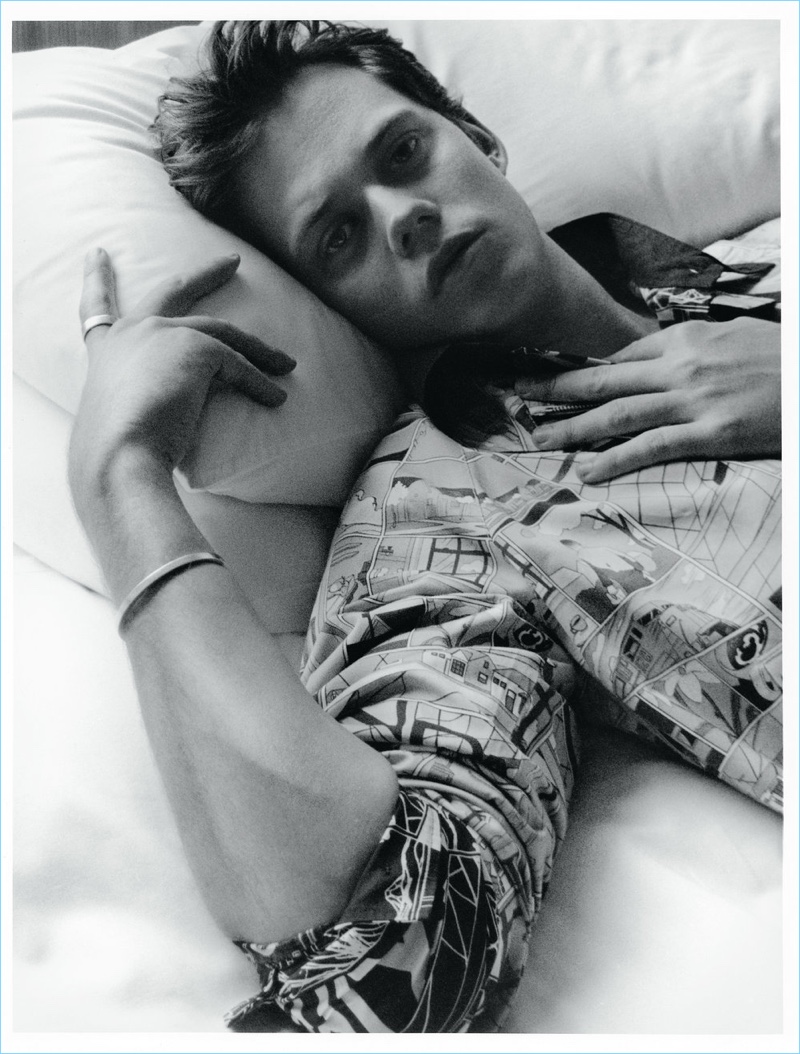 Actor Bill Skarsgård sports a Prada shirt and jacket.