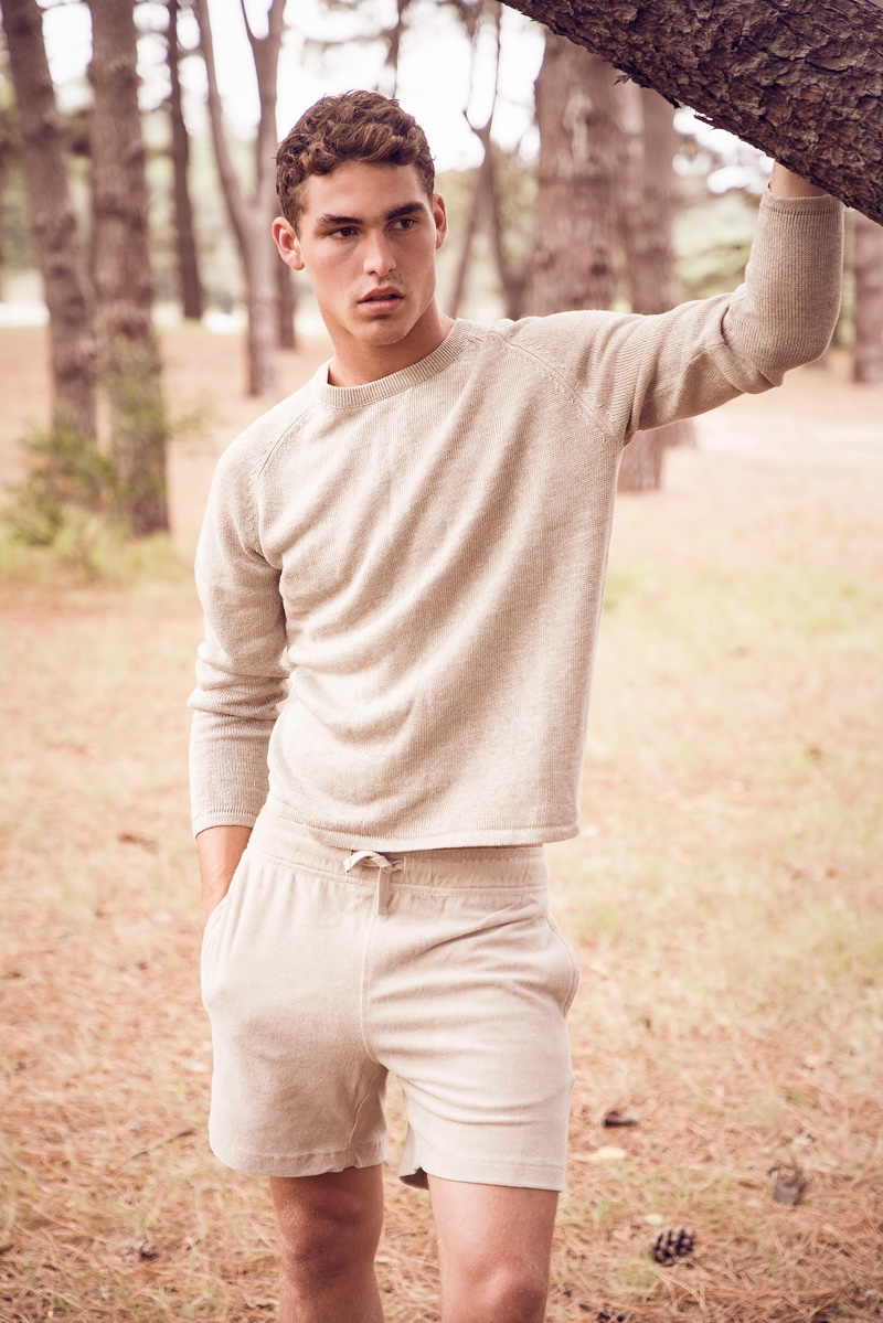 Making a case for neutrals, Brayden wears a sweater and shorts from Venroy.