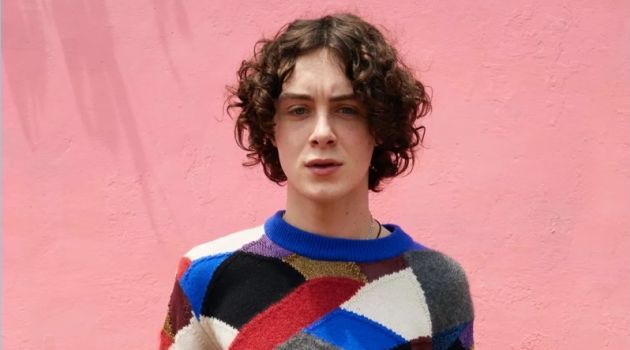 Sonny Hall wears a multi-colored sweater for Burberry's pre-fall 2018 campaign.
