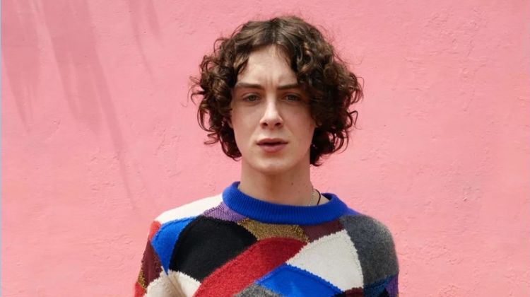 Sonny Hall wears a multi-colored sweater for Burberry's pre-fall 2018 campaign.