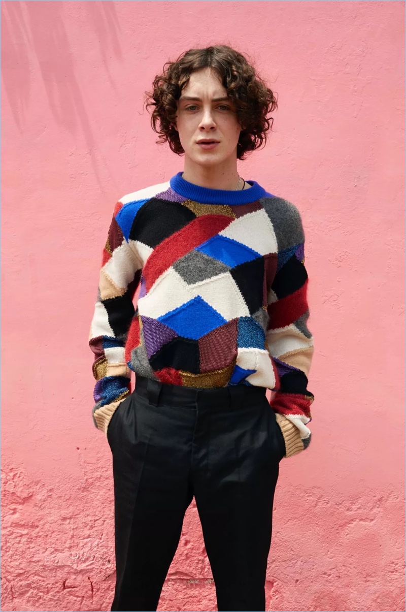 Sonny Hall wears a multi-colored sweater for Burberry's pre-fall 2018 campaign.