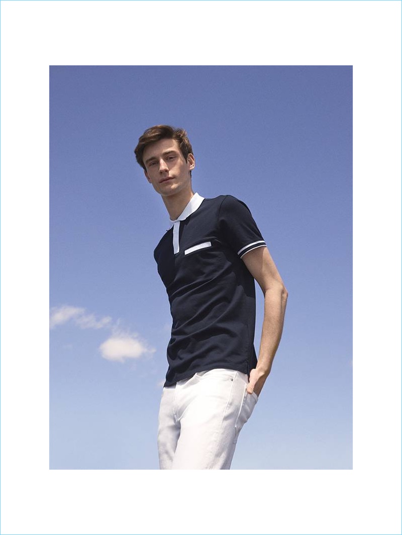 Sporting navy and white, Matt Doran wears a Club Monaco welt pocket polo and white jeans.