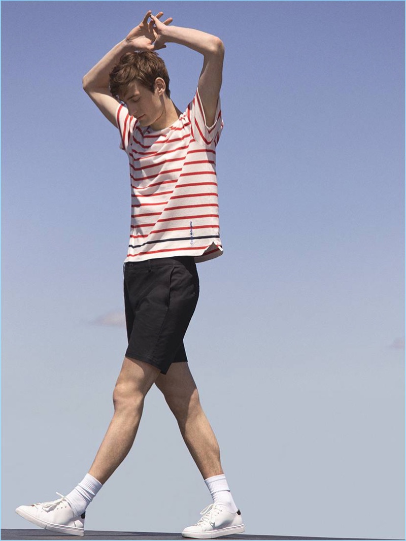 Stretching, Matt Doran wears a Club Monaco striped tee with Baxter shorts.