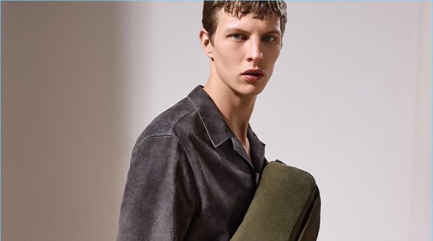 Tim Schuhmacher Kicks Off Fall in Style with Dunhill Model Tim Schuhmacher sports Dunhill's trendy belt bag with a suede shirt.