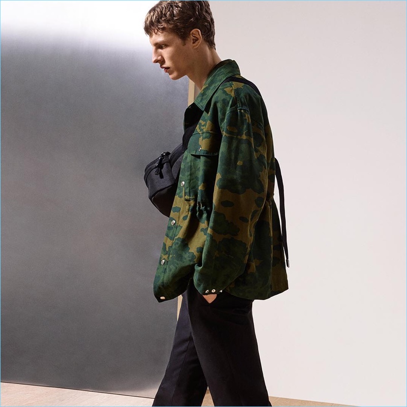 Enjoying a camouflage moment, Tim Schuhmacher wears Dunhill's foliage print shirt jacket.