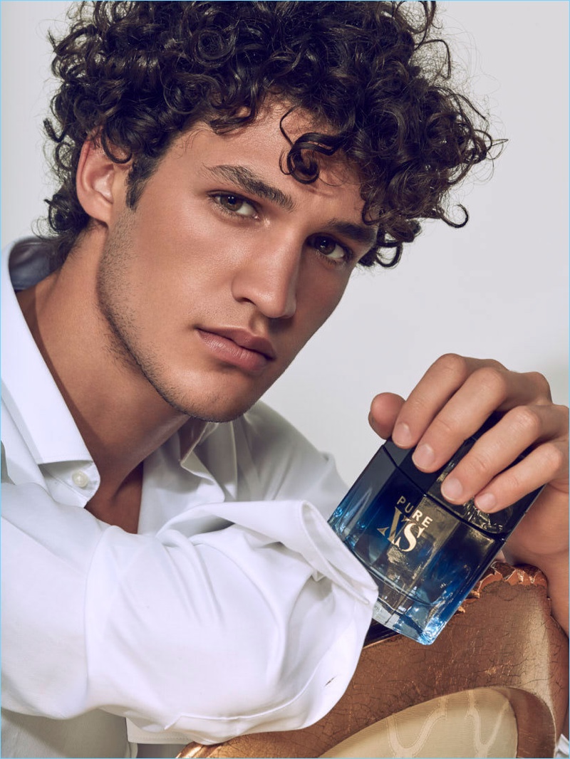 Model Francisco Henriques appears in a picture with Paco Rabanne's Pure XS fragrance.