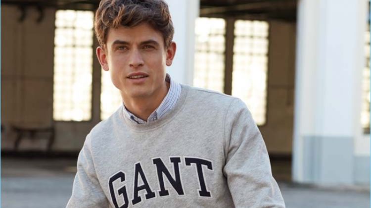 Sporting a GANT pullover, Luc van Geffen fronts the brand's spring-summer 2018 campaign.