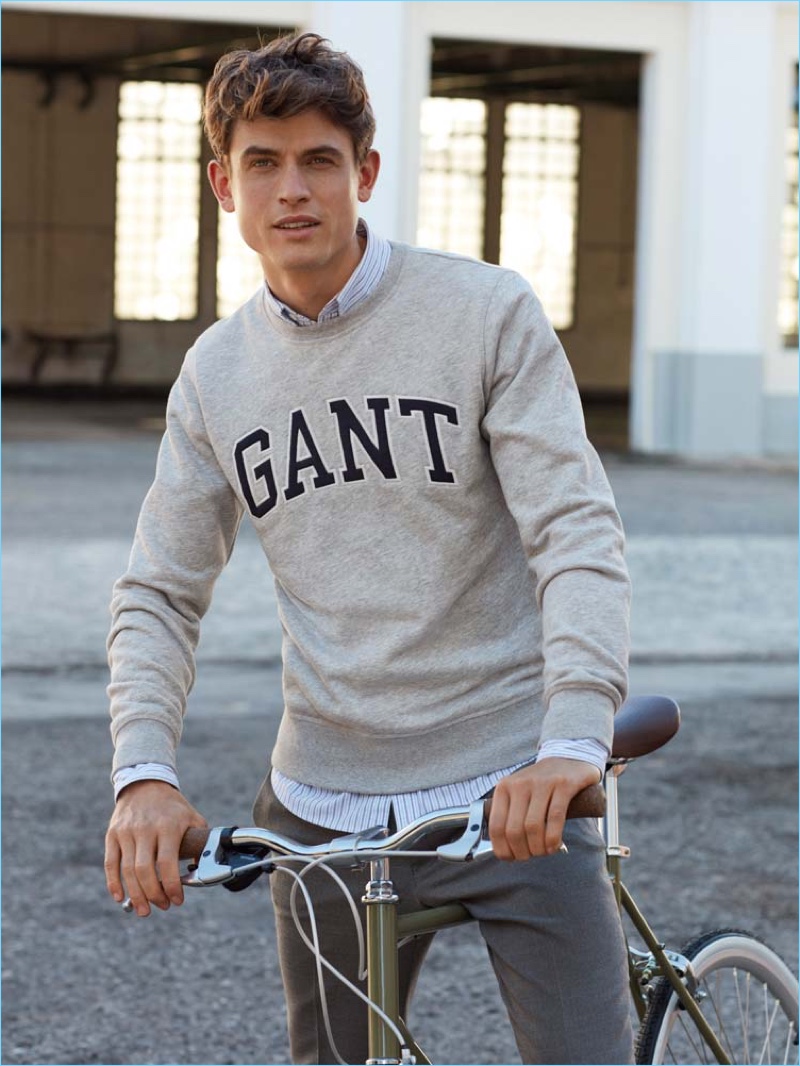 Sporting a GANT pullover, Luc van Geffen fronts the brand's spring-summer 2018 campaign.
