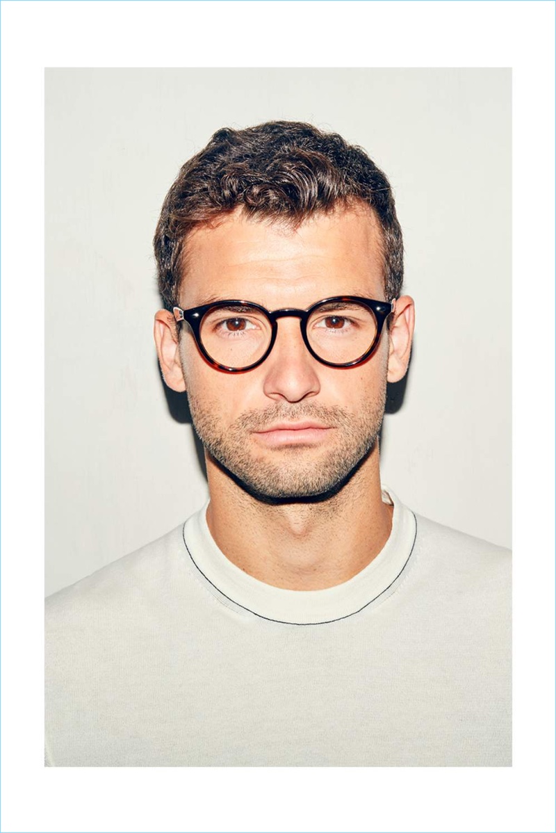 Ready for his close-up, Grigor Dimitrov sports a Dunhill t-shirt and Ray-Ban glasses.