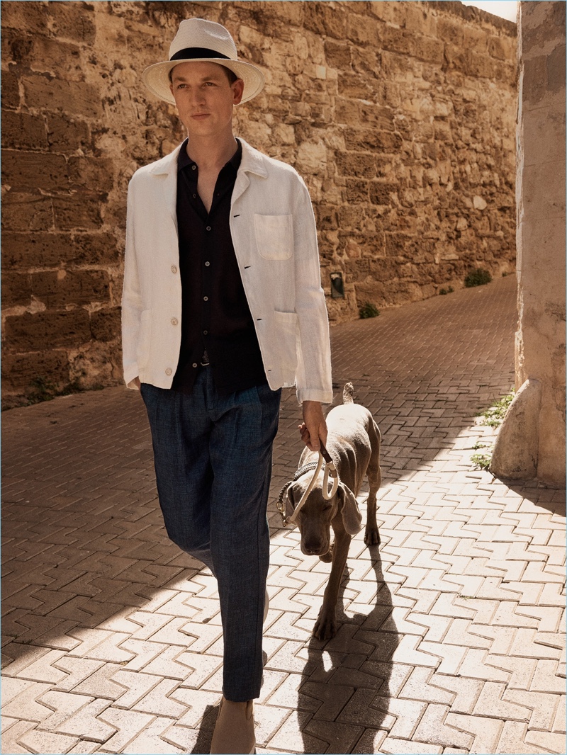 Staying cool, Hugo Sauzay dons a linen look from Mango Man.