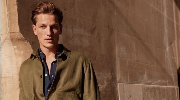 Hugo Sauzay Models Mango Man's Summer Essentials Embracing military style, Hugo Sauzay models a lightweight linen jacket by Mango Man.