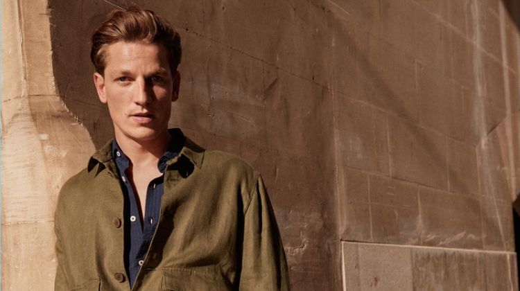 Embracing military style, Hugo Sauzay models a lightweight linen jacket by Mango Man.