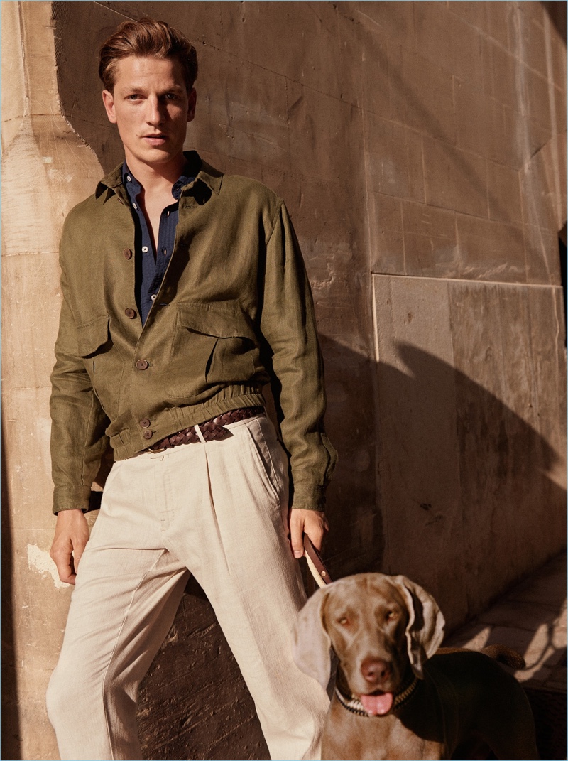 Embracing military style, Hugo Sauzay models a lightweight linen jacket by Mango Man.