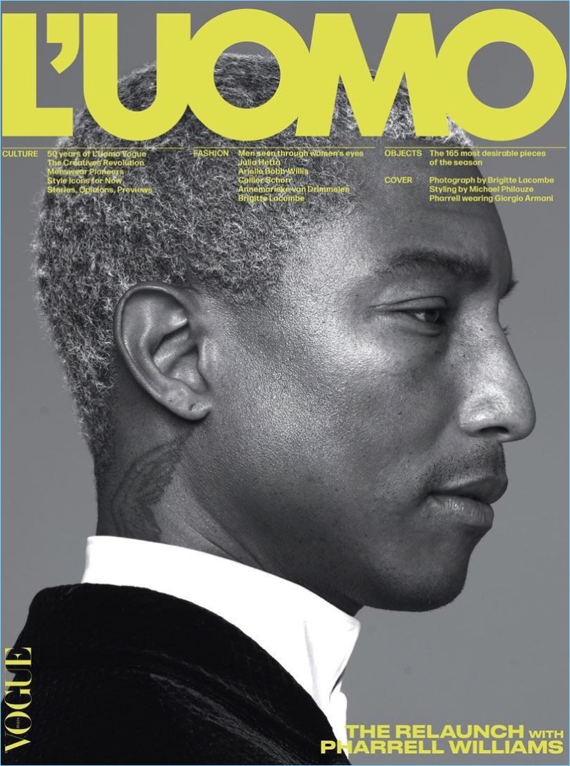 Pharrell Williams covers L'Uomo Vogue in Giorgio Armani. Delivering a side profile, Pharrell is photographed by Brigitte Lacombe with styling by Michael Philouze.