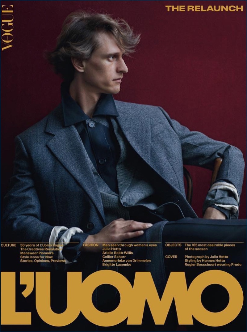 Rogier Bosschaart covers L'Uomo Vogue in Prada. The Dutch model is photographed by Julia Hetta with styling by Hannes Hetta.