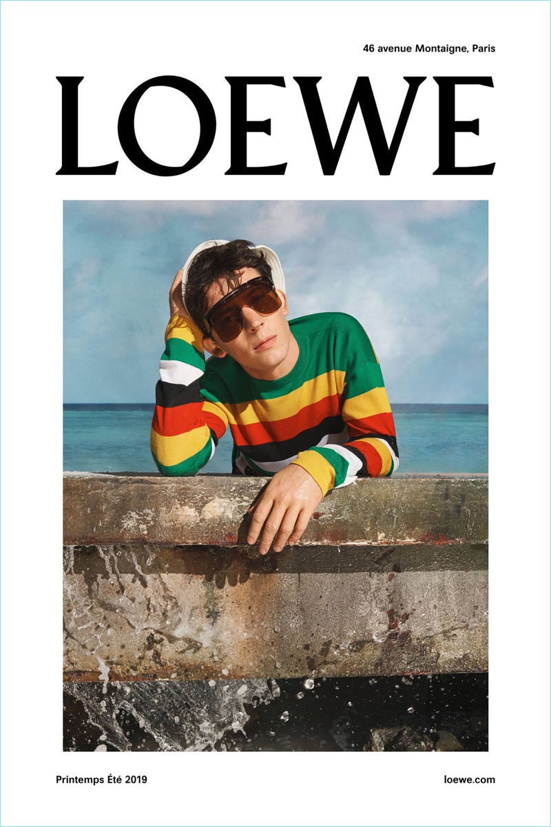 Actor Josh O’Connor wears a colorful striped sweater for Loewe's spring-summer 2019 campaign. » Josh O'Connor & Oscar Kindelan Star in Loewe Spring '19 Campaign Actor Josh O’Connor wears a colorful striped sweater for Loewe's spring-summer 2019 campaign.
