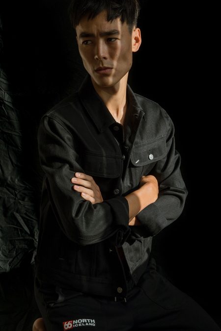 Mihn wears denim jacket Acne Studios and pants 66North.