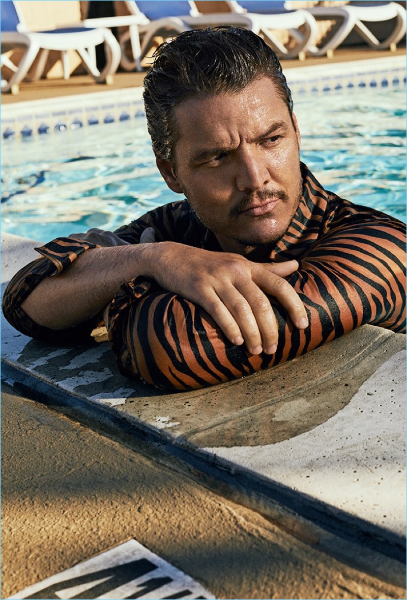 Actor Pedro Pascal wears an animal print shirt from Bottega Veneta.